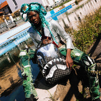 METALLIC DRIP SHARKS IN PARIS DLXSV BACKPACK