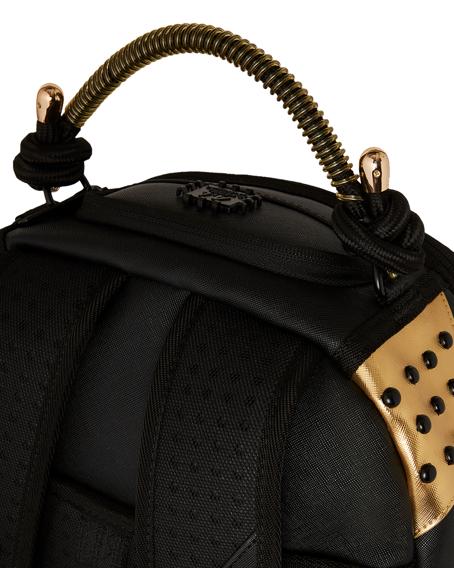 AI WONDERLAND GOLD AND BLACK DLXSV BACKPACK