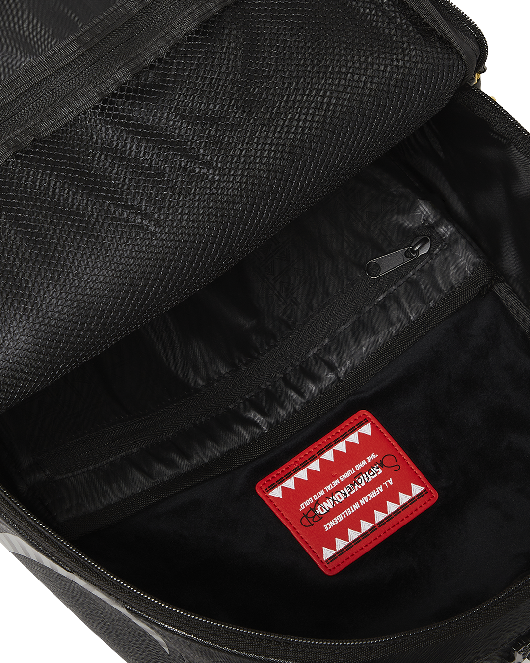 AI WONDERLAND GOLD AND BLACK DLXSV BACKPACK