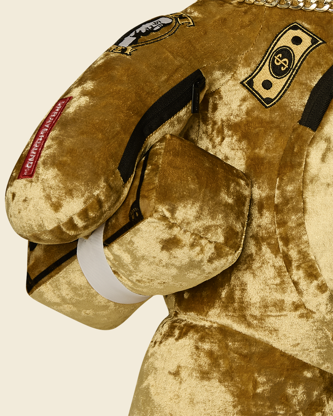SHARKS IN PARIS GOLD DRIP MONEYBEAR BACKPACK