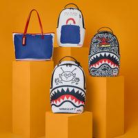 KEITH HARRING EMBOSSED SHARK HANDBAG PRINT BACKACK